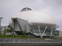 Ue]